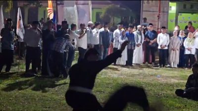 SERU! Aksi Seni Bela Diri Dipertontonkan Penyambutan Anwar -Reny di Lambunu